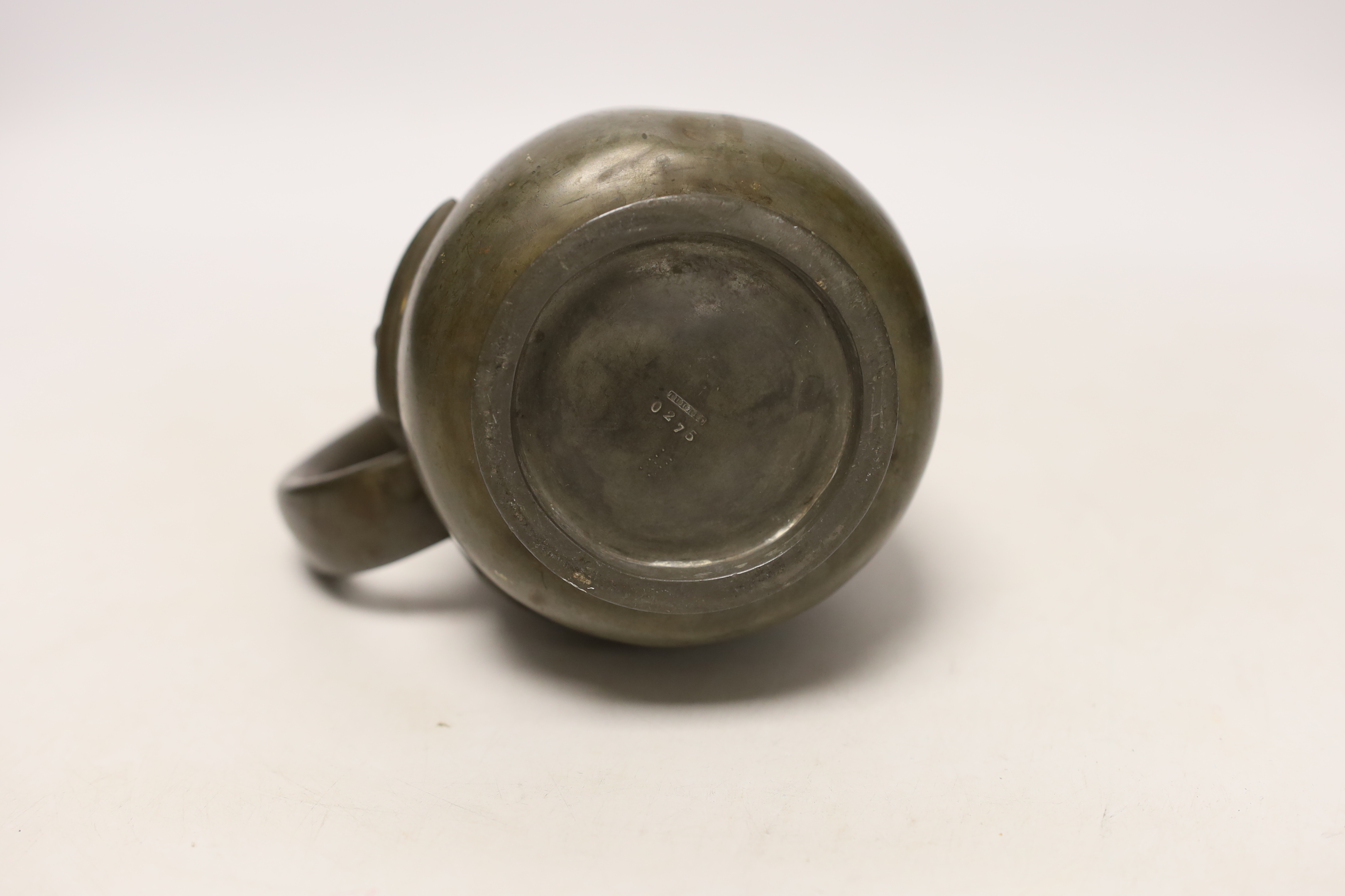 A Liberty Tudric pewter water jug, 17cm high